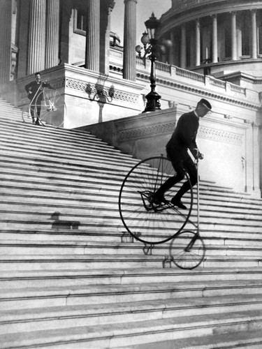 Vintage biking down stairs - biking,